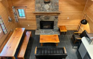 cabin 6. inside view looking down to large kitchen table.